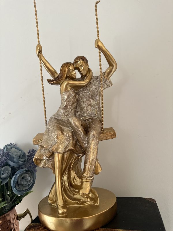 Pareja Columpio
